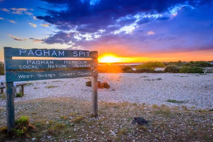 Pagham Spit sign at sunset